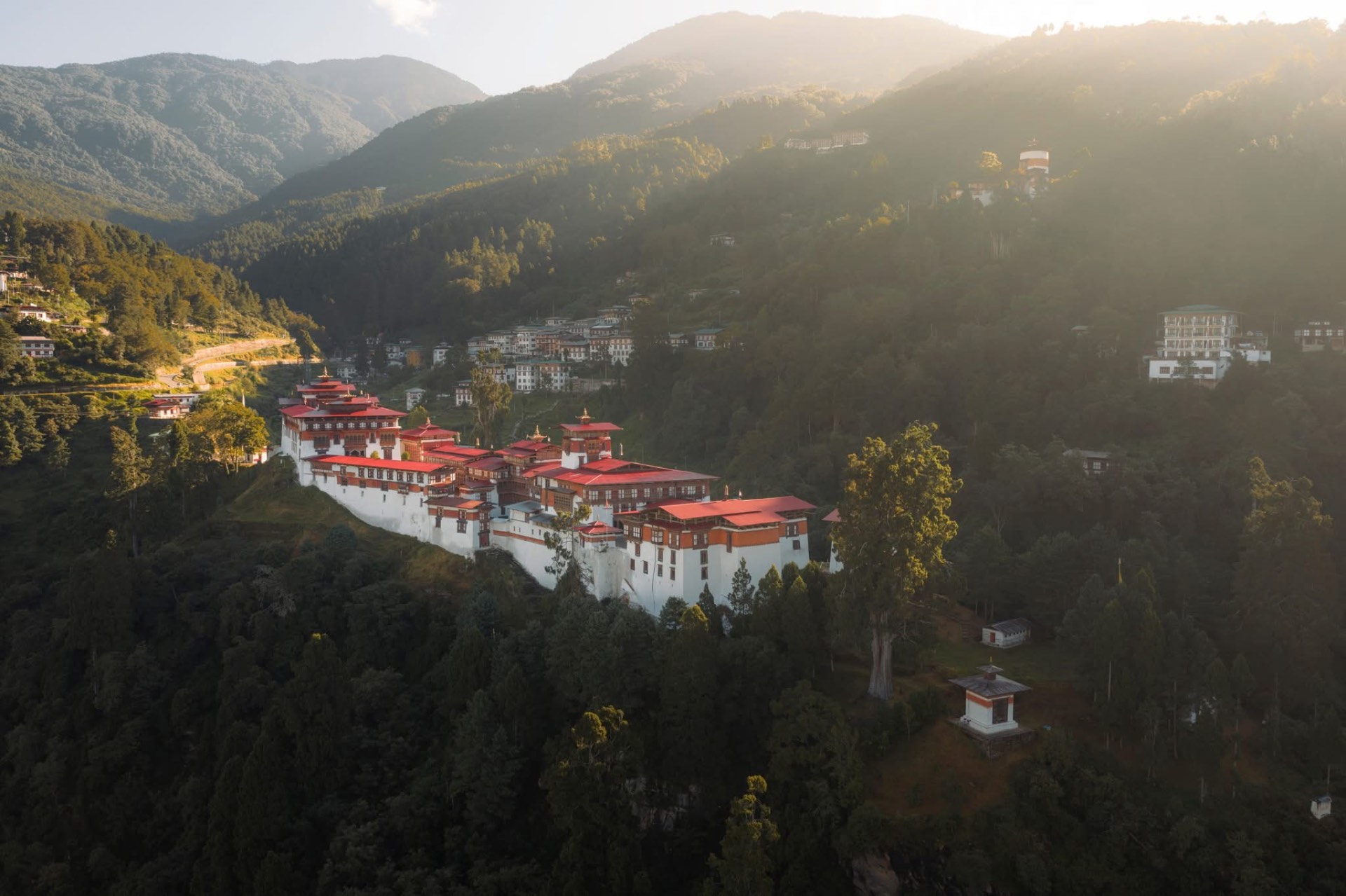 Trongsa Dzong on its ridge above the forested valleys of central Bhutan